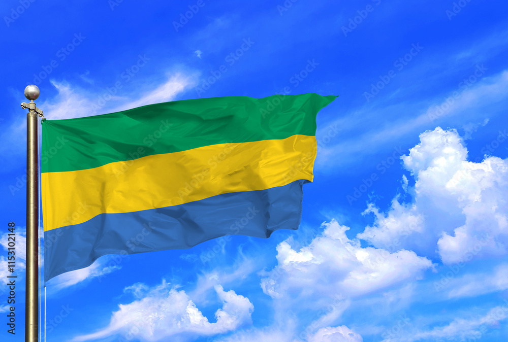 Elegant Flag of Gabon Waving Beneath a Clear Blue Sky Elegant Flag of Gabon Waving Beneath a Clear Blue Sky