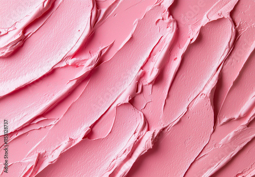 Close-up of a pink clay cosmetic texture for the face and body, a cream or mask with oil photo