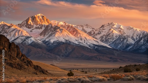 Golden Hour Snowcapped Mountains: Majestic Alpine Landscape at Sunset