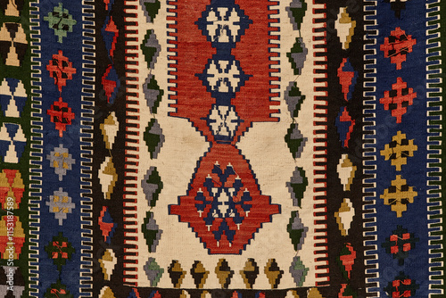 Obraz na płótnie Turkish traditional rug with geometric vivid colors designs. Istanbul w salonie