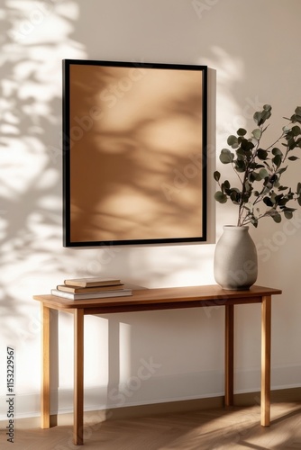 Wallpaper Mural Modern interior design with empty frame, plant, and books on wooden table Torontodigital.ca