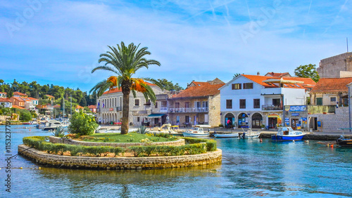 Foto View of the monuments of Vrboska, attractions on the island of Hvar, moored boat