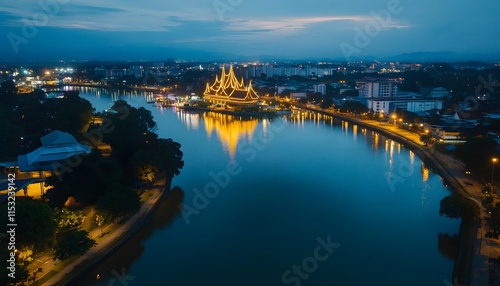 Bird eye view of the bustling Kuching Waterfront, with vibrant city lights reflecting on the calm waters of the Sarawak River, in 4K resolution