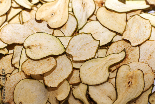 Dried pears, frips, pear slices, dried fruits, pear background, fruit background, selective focus photo