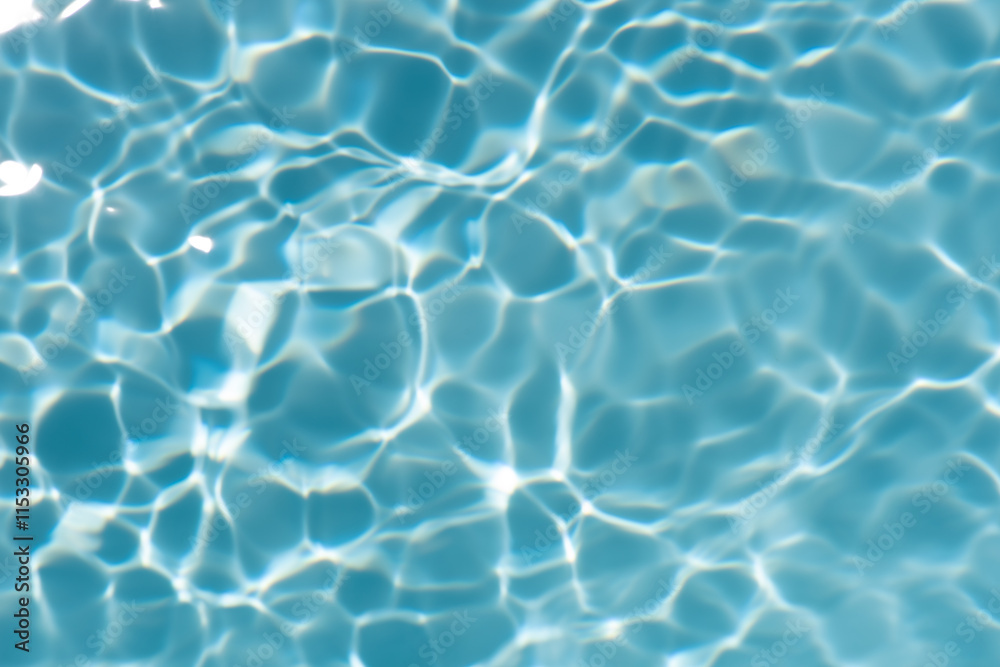 Blue water with ripples on the surface. Defocus blurred transparent blue colored clear calm water surface texture with splashes and bubbles. Water waves with shining pattern texture background. Blue water with ripples on the surface. Defocus blurred transparent blue colored clear calm water surface texture with splashes and bubbles. Water waves with shining pattern texture background.