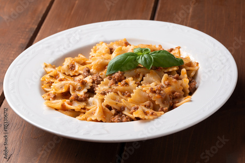 Farfalle con salsa alla bolognese, pasta italiana, cibo europeo  photo