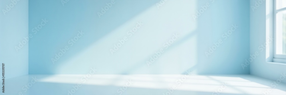 Minimalist empty blue room with sunlight streaming through a window creating a peaceful and serene atmosphere, perfect for product display or a calming backdrop. Minimalist empty blue room with sunlight streaming through a window creating a peaceful and serene atmosphere, perfect for product display or a calming backdrop.