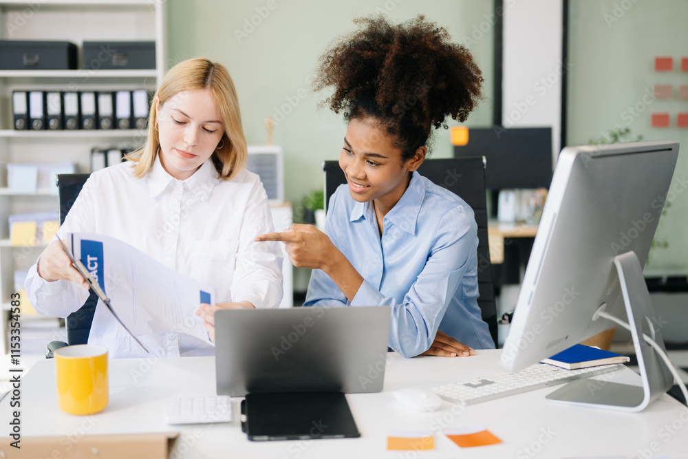 Businesswoman leading team meeting and using tablet and laptop computer with financial Businesswoman leading team meeting and using tablet and laptop computer with financial