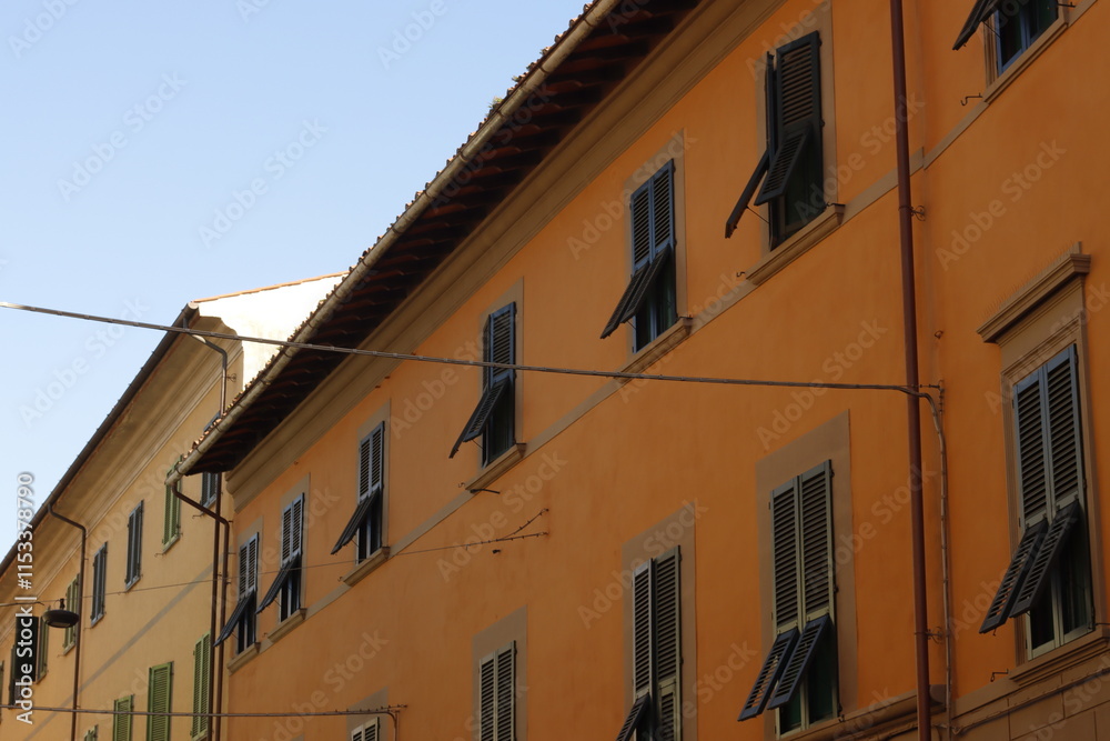Facade of a classic building in the downtown of Pisa, Italy Facade of a classic building in the downtown of Pisa, Italy