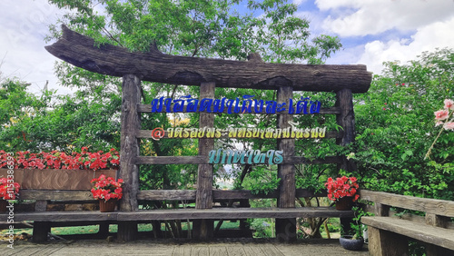 Photo of an old tree resting area at the tourist attraction of Wat Roi Phra Phutthabat Phu Manorom, Mueang District, Mukdahan Province, Thailand.