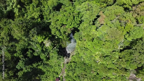 Mentawai Islands Regency, West Sumatra, February 9, 2024: Aerial video of the Kulukubuk waterfall tourist attraction, Madobag Village, South Siberut, Mentawai Islands Regency. photo