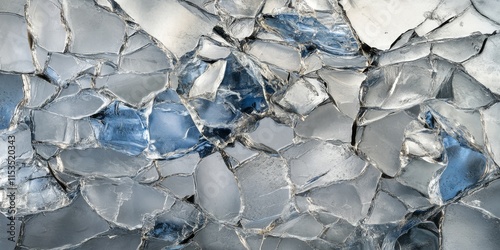 Cracked ice in shades of gray and blue creates a stunning reflective texture, showcasing a multi faceted design that highlights the beauty of gray blue cracked ice in various forms. photo