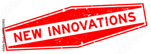 Grunge red new innovations word hexagon seal stamp on white background