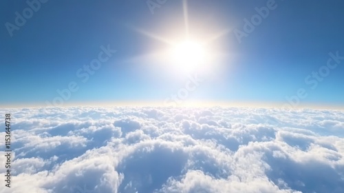 Wallpaper Mural A wide shot of the sky with fluffy white clouds and a bright sun shining above, creating an ethereal atmosphere.  Torontodigital.ca