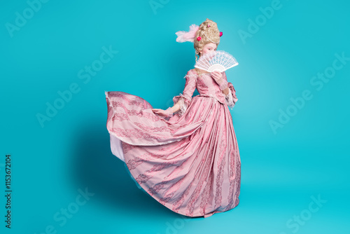 Foto Photo of charming rococo duchess lady wear corset ball gown hold fan carnival is