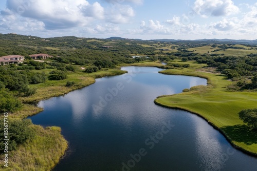 An idyllic landscape features a serene lake and lush greenery, providing a peaceful setting that emphasizes the beauty of nature and tranquility.