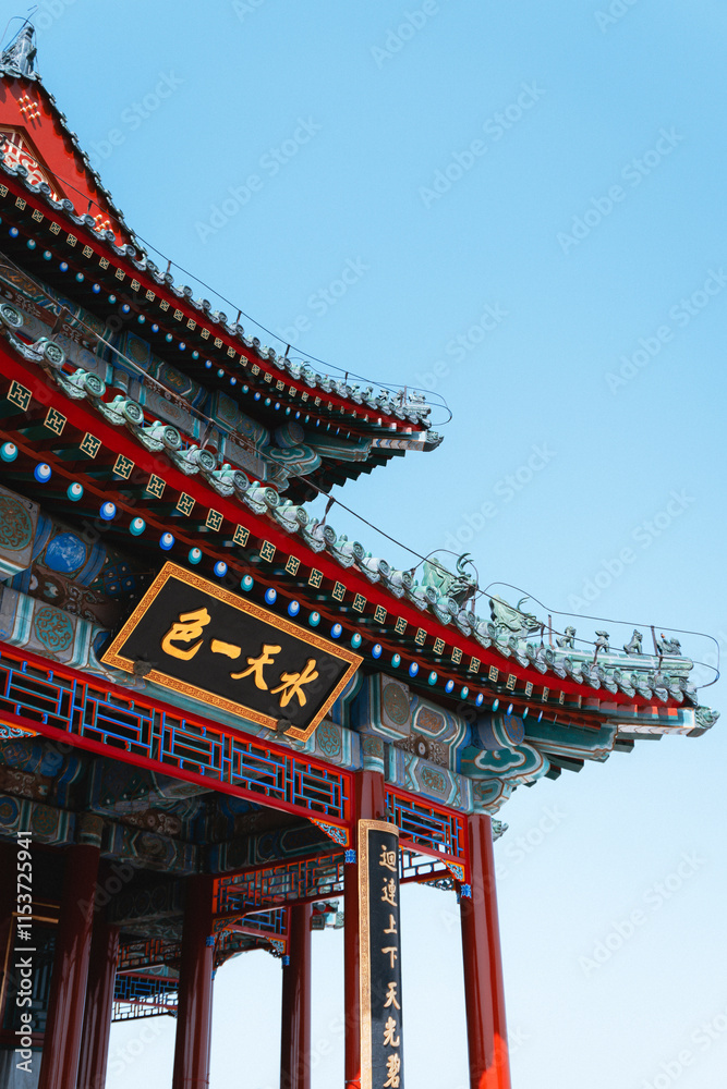 Traditional Chinese architecture with vibrant red pillars and intricate roof details Traditional Chinese architecture with vibrant red pillars and intricate roof details