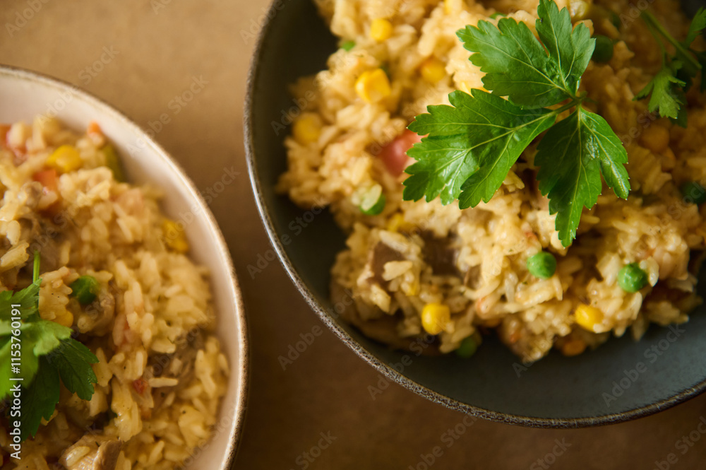 Close-up of vegetarian paella garnished with fresh herbs in two serving bowls Close-up of vegetarian paella garnished with fresh herbs in two serving bowls