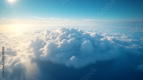 Aerial view of fluffy cloudscape at sunrise.