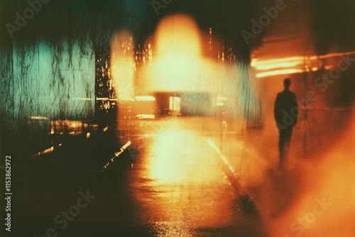 night photo with man walking on the street, blurry