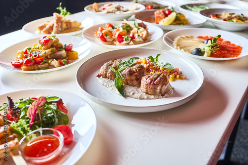Restaurant Table with a Variety of Dishes