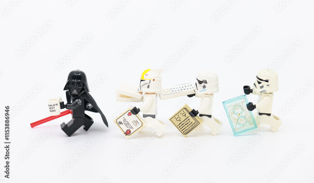 Obraz premium Hong Kong - December 24 2024: death Vader hold the world best boss cup and chasing by stormtrooper