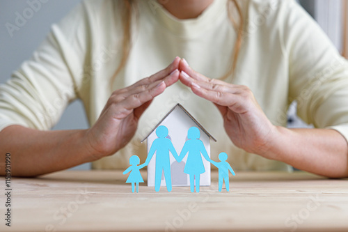 Home, health and general life insurance concept with family