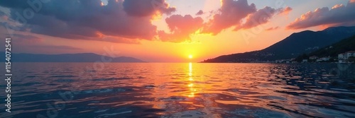 Serene sunset scene with rippled Adriatic Sea horizon, water, mount conero