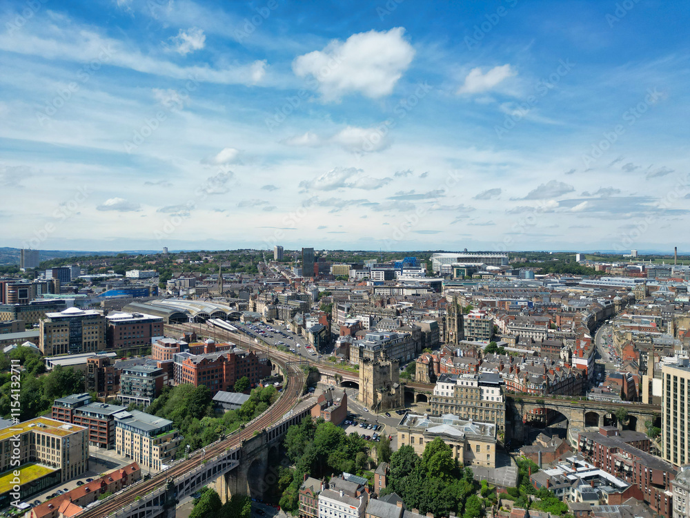 Central Newcastle City from River Tyne at Northern England United Kingdom. July 19th, 2024, High Angle Drone's Camera Footage Was Captured from Medium High Altitude. Central Newcastle City from River Tyne at Northern England United Kingdom. July 19th, 2024, High Angle Drone's Camera Footage Was Captured from Medium High Altitude.