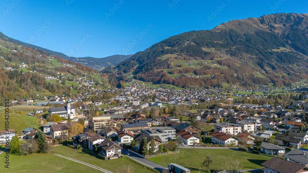 Fototapeta premium The village of Tschagguns in the Montafon Valley with Schruns in the background, State of Vorarlberg, Austria, Drone Photography