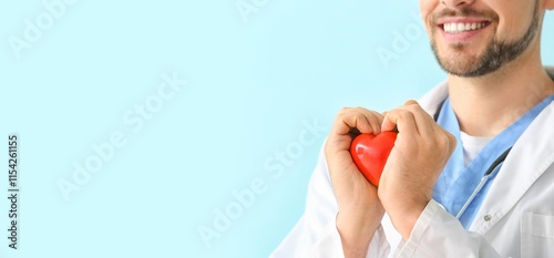 Male cardiologist holding r...