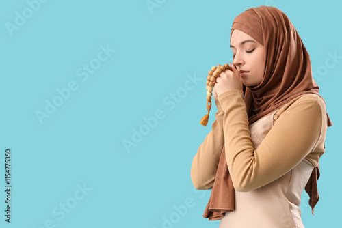 Young Muslim woman in hijab...