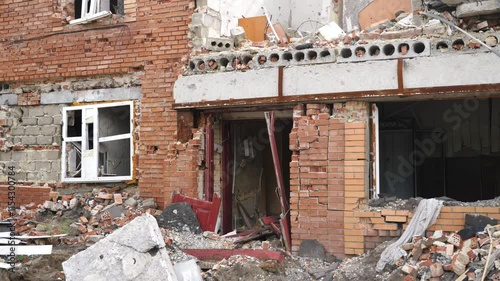 View to destroyed residential buildings at Kharkivska oblast. Ruined houses after bomb attacks on ukrainian territory from russia army. Consequences of russian invasion of Ukraine. Slow motion