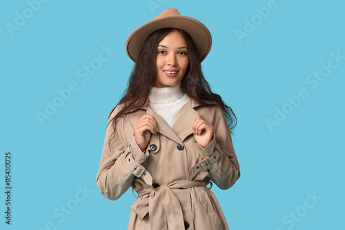Smiling young woman in styl...