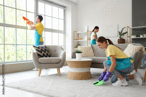 Team of janitors cleaning i...