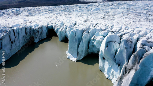Aerial view of the ice cliffs in the front part of the Fjallsjokull glacier in southeast Iceland.  photo