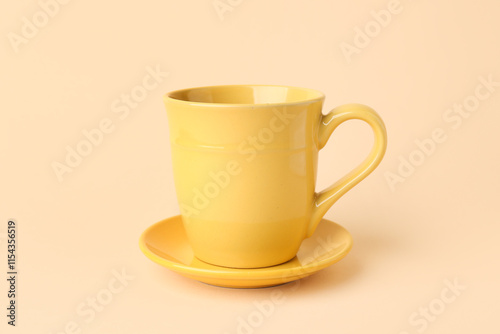 Bright yellow ceramic coffe...