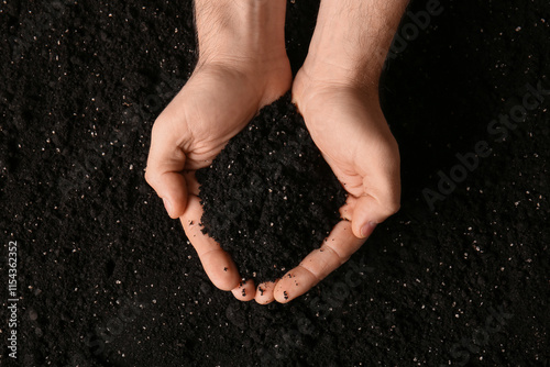 Female hands with black soi...