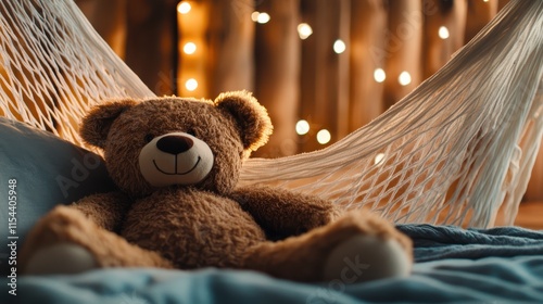 A cozy teddy bear is nestled in a hammock, illuminated by warm, ambient lights, creating a soothing and comforting atmosphere of relaxation and peace. photo