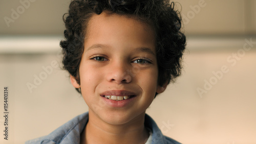 Tableau sur toile Close up portrait little boy African American ethnic child son male baby pupil s