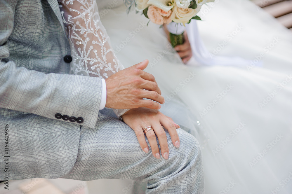 A Romantic Moment: Newlyweds Intertwined in a Tender Touch A Romantic Moment: Newlyweds Intertwined in a Tender Touch