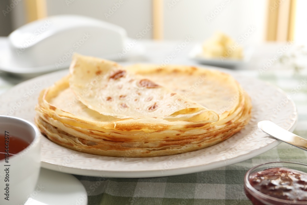 Stack of delicious crepes on table, closeup Stack of delicious crepes on table, closeup