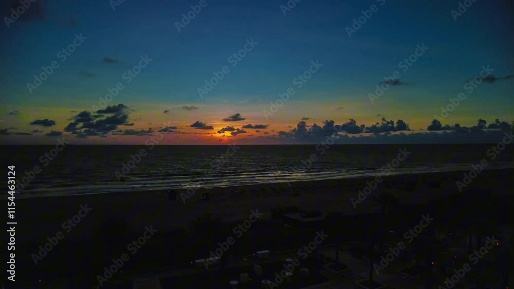 Hyperlapse drone footage of the sunrise over Las Olas Beach in Fort Lauderdale, Florida, USA