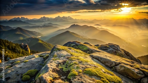 Golden Hour Light Bathes a Mossy Rock Outcropping, Offering a Breathtaking View of the Distant Mountain Range