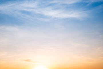 Sky,sunset, beautiful , luxury soft gradient orange gold clouds and sunlight on the blue sky perfect for the background, Sunrise on morning or everning in winter warm time ,Twilight summer,silhouette