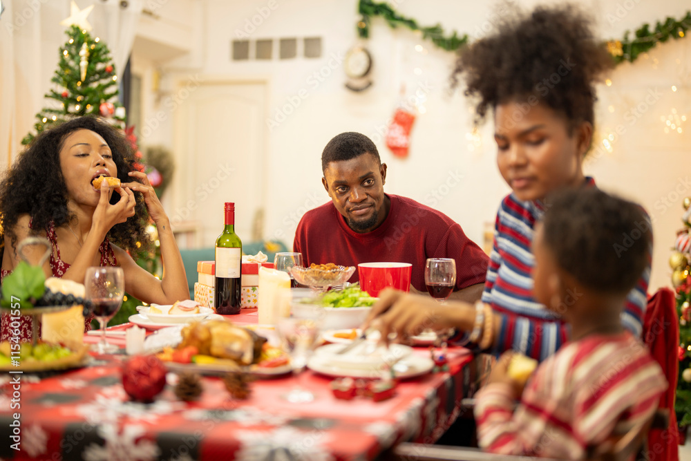 A joyful family shares a Christmas meal together, passing food and creating holiday memories. Decorated tree, festive lights, and presents in the background add warmth to cozy celebration atmosphere. A joyful family shares a Christmas meal together, passing food and creating holiday memories. Decorated tree, festive lights, and presents in the background add warmth to cozy celebration atmosphere.