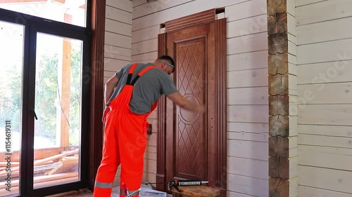 Wallpaper Mural Professional installs wooden door. Door made of elite wood species Torontodigital.ca