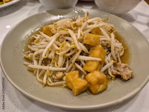 Traditional stirred and fried vegetable menu serving on the plate. Famous easy digestion menu for patient.