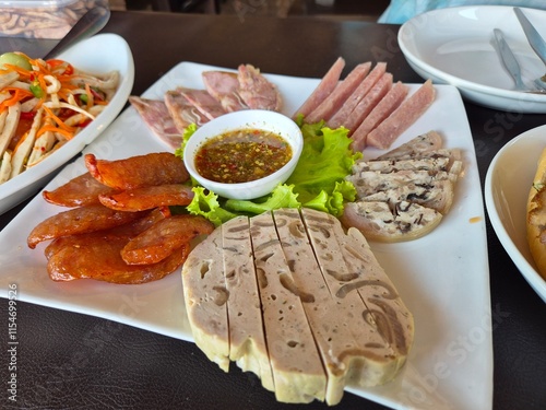 Hors d'oeuvres set menu. Vietnamese starter plate, pork sausage, sour pork, and cold served meat.