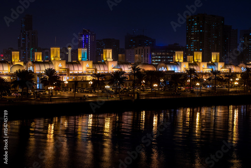 The Gold Souq Market, a historic landmark in Sharjah’s center, is near the Corniche and a public park, offering a picturesque setting for night photography and a popular spot for families to gather.